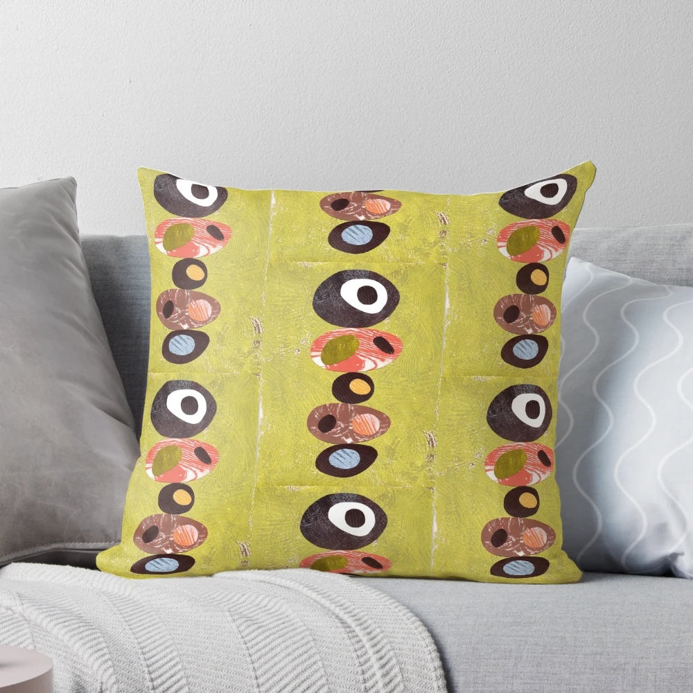 Vibrant mid-century modern throw pillow featuring an abstract collage of simple geometric shapes in a retro color palette