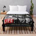 Vintage-style plush blanket featuring classic Elvis Presley imagery