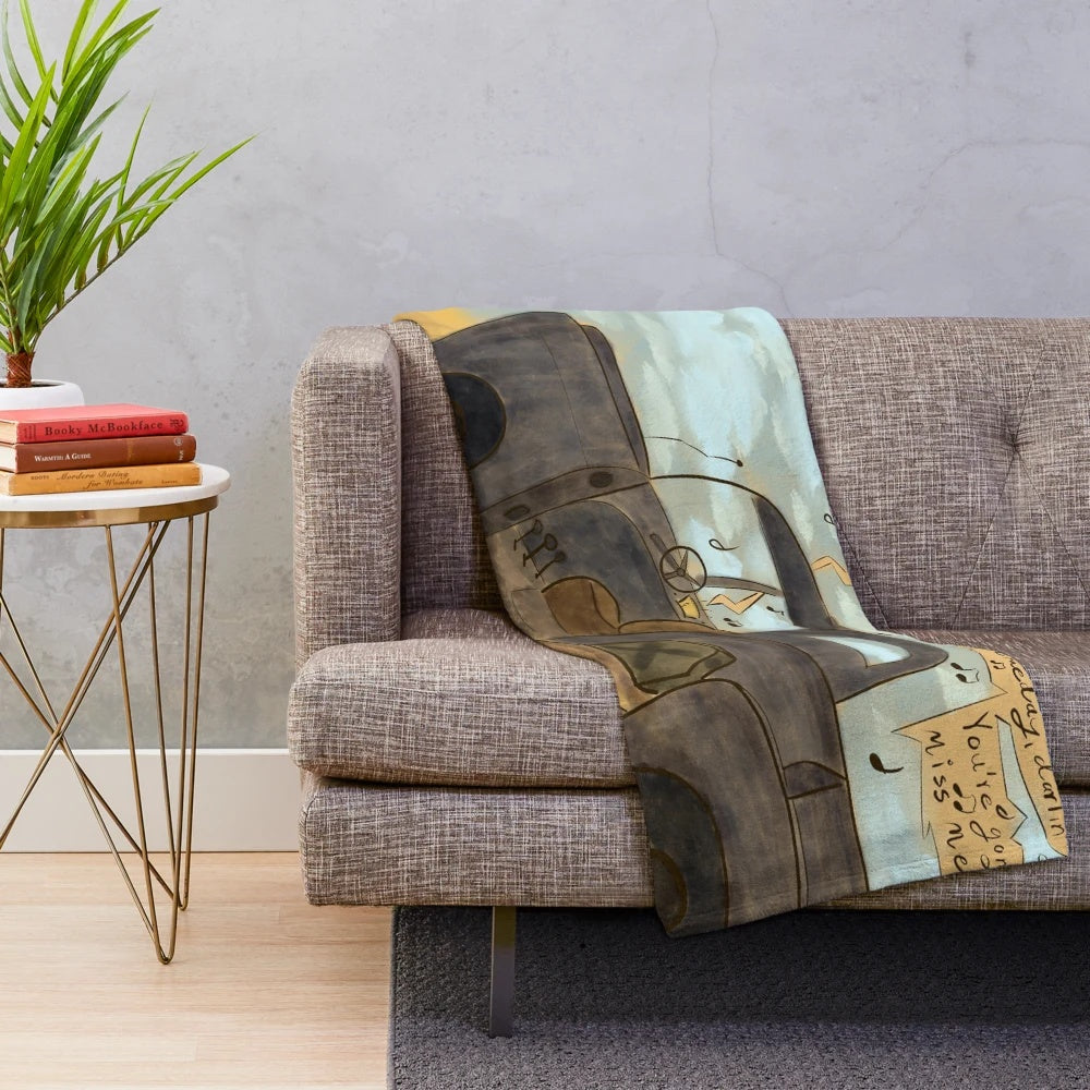 Retro-style plush blanket featuring a post-apocalyptic wasteland design inspired by the Fallout video game series