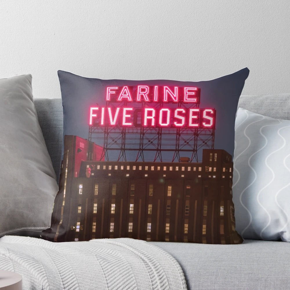 Vibrant Farine Five Roses night scene pillow with neon pink and glow accents, showcasing the iconic Montreal cityscape.