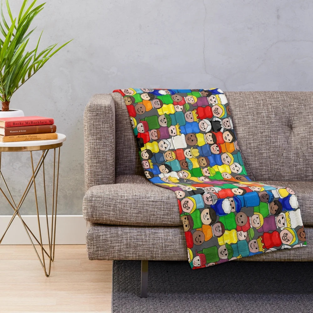 Cozy plush blanket with all-over Fisher Price Little People characters