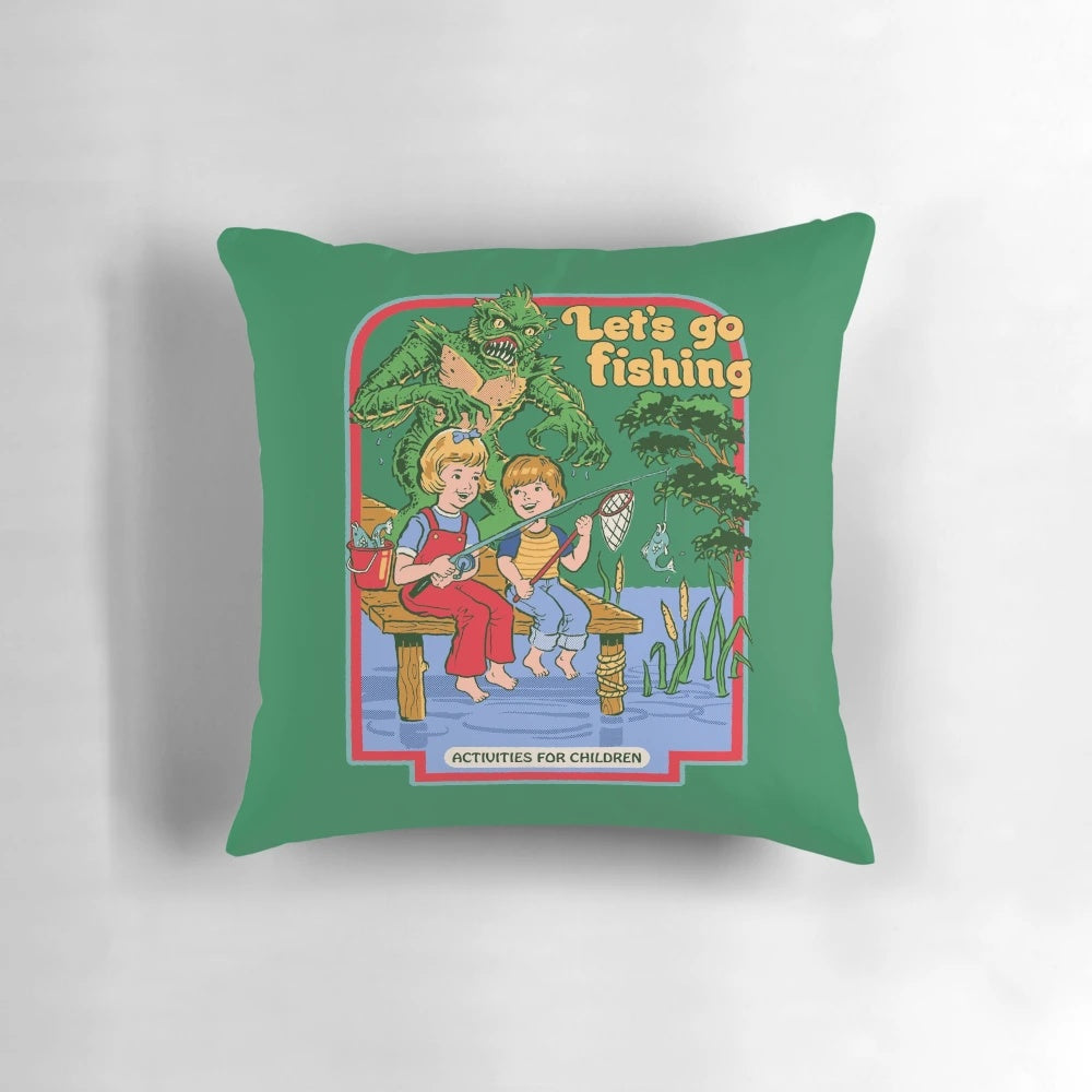 Retro-style fishing pillow featuring a Creature from the Black Lagoon inspired design