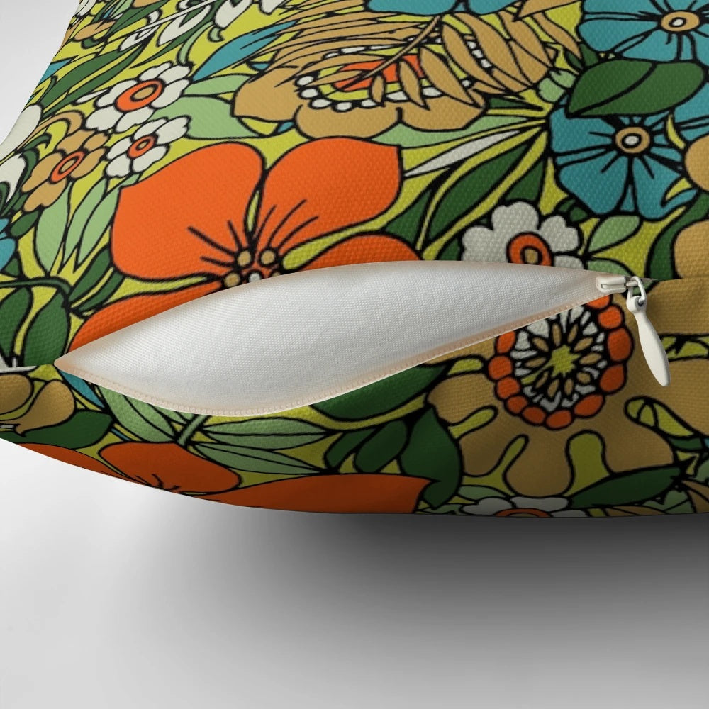 Colorful retro-style floral pillow with a vintage 70s boho botanical bouquet design