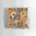 Retro floral Halloween pillow with orange, gray, and black daisies, dahlias, and mums