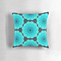 Retro floral patterned Margo pillow in shades of blue, teal, and grey