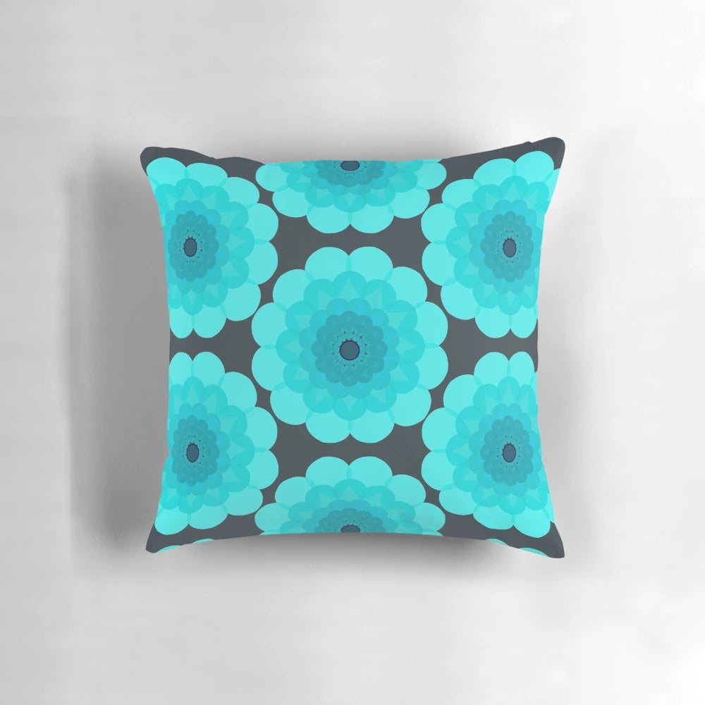 Retro floral patterned Margo pillow in shades of blue, teal, and grey
