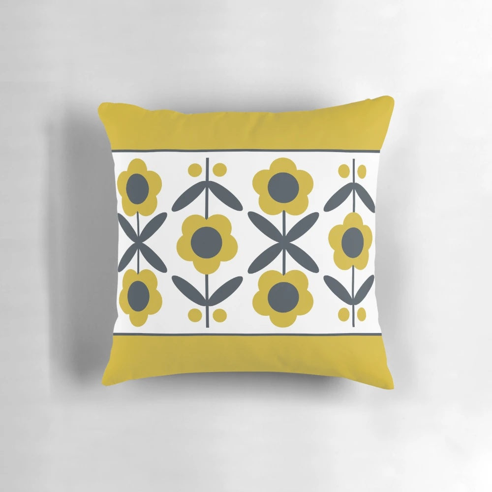 Retro-styled mustard yellow floral pattern pillow with a mid-century modern design