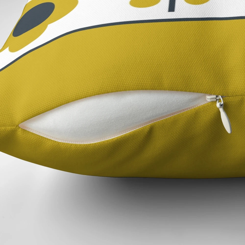 Retro-styled mustard yellow floral pattern pillow with a mid-century modern design