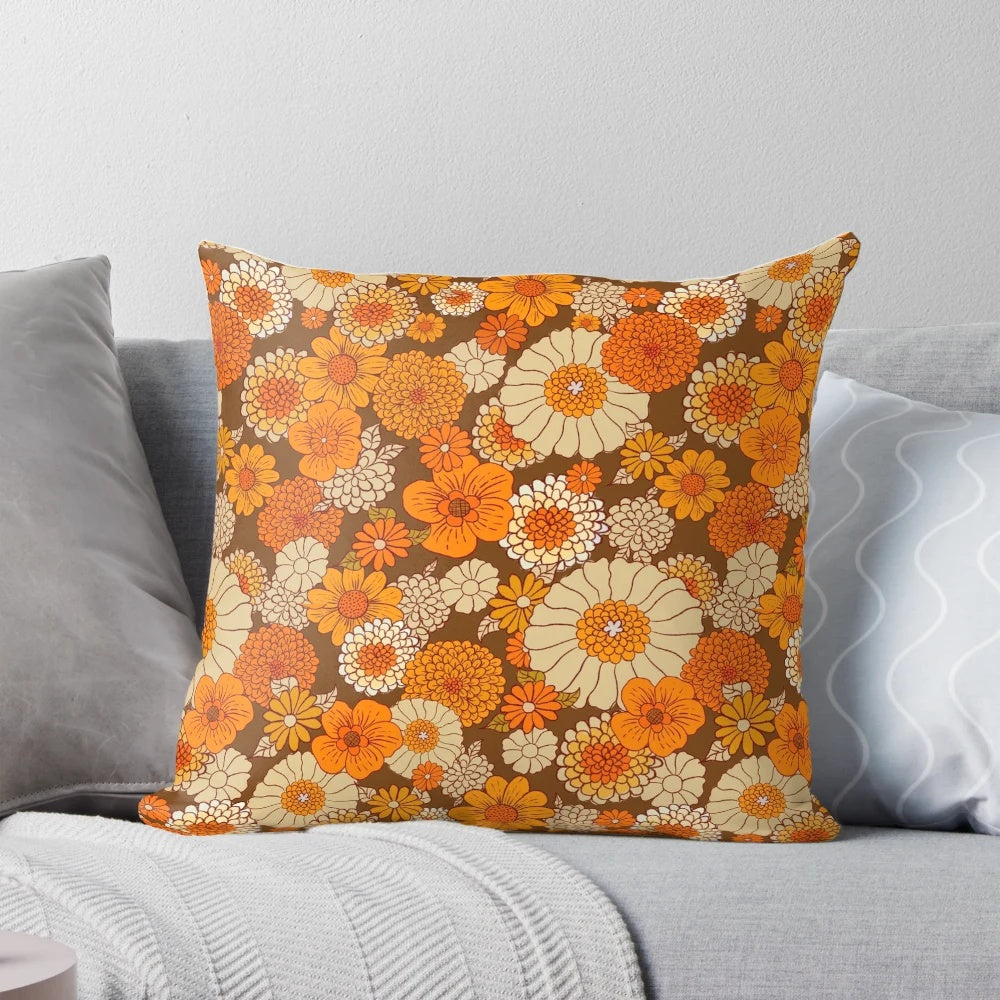 Colorful retro floral pattern pillow in shades of orange and brown