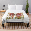 Retro floral patterned plush blanket in autumn colors