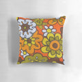 Vintage-inspired floral print pillow in avocado green, harvest gold, brown, and orange colors