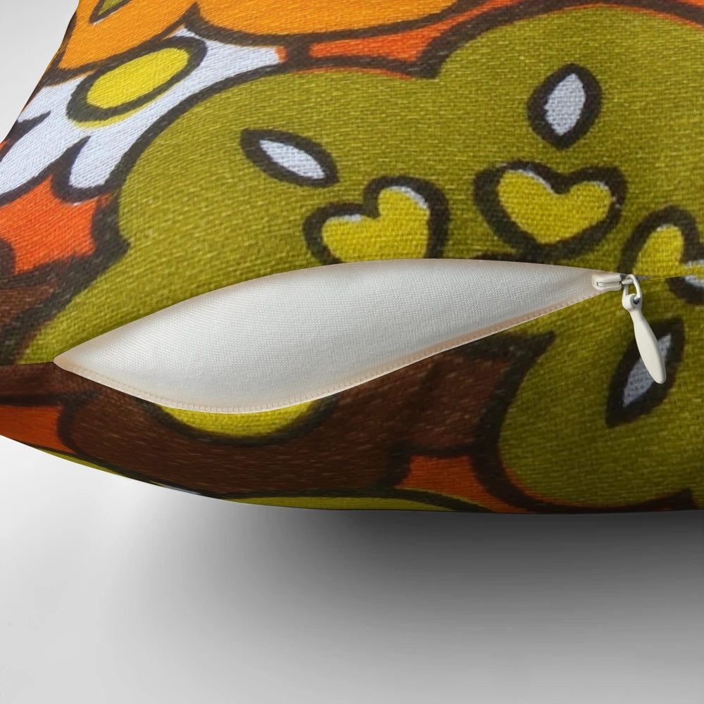 Vintage-inspired floral print pillow in avocado green, harvest gold, brown, and orange colors