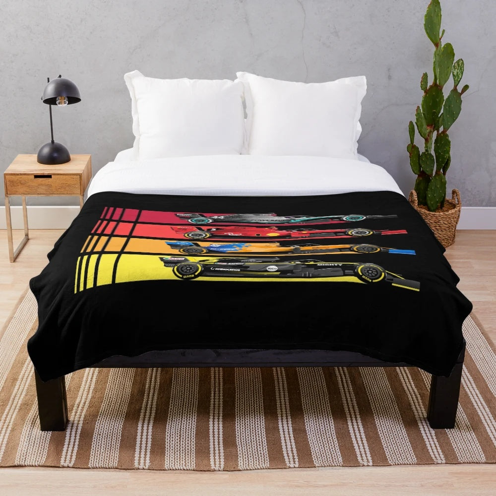 Plush blanket featuring vintage formula race cars