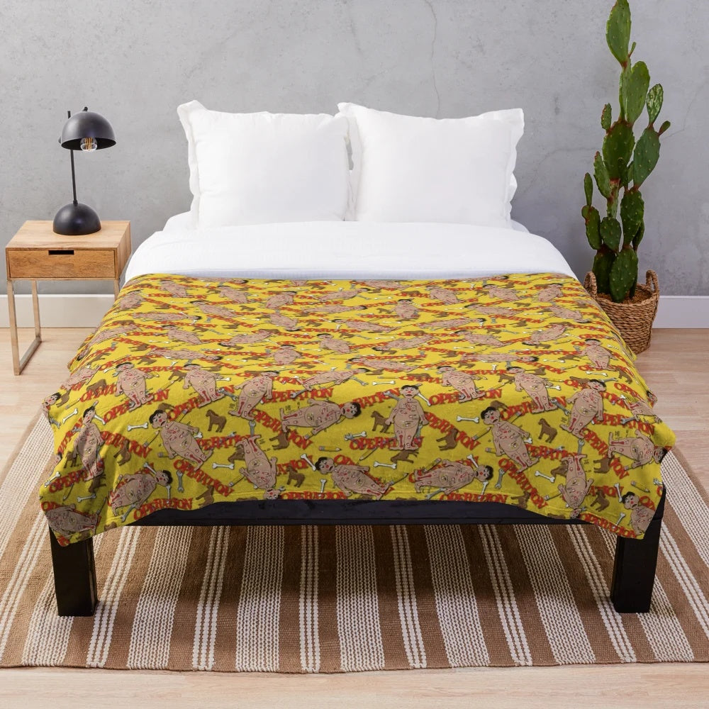 Plush blanket featuring classic board game designs and nostalgic game pieces