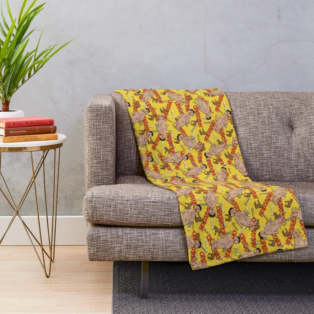 Plush blanket featuring classic board game designs and nostalgic game pieces