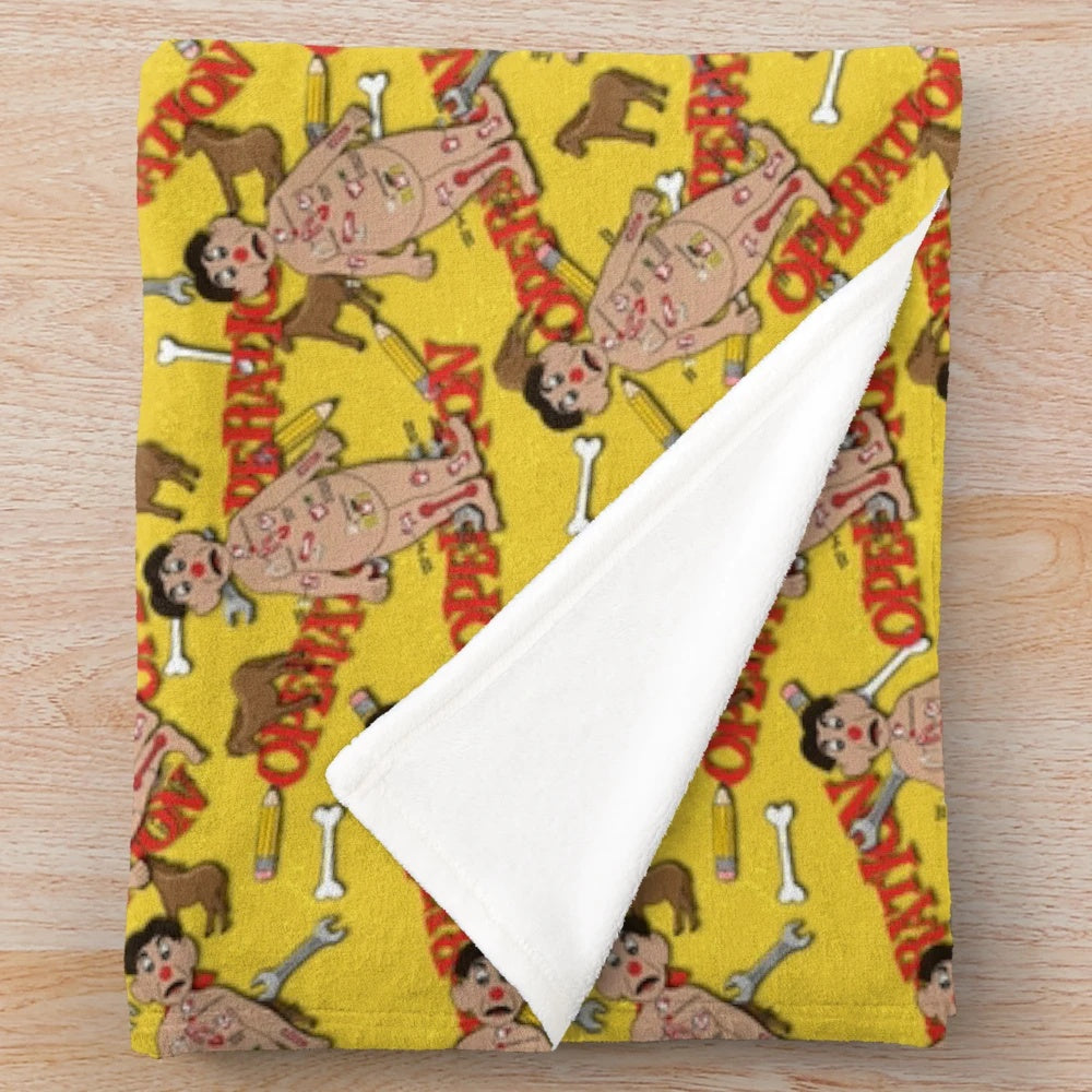 Plush blanket featuring classic board game designs and nostalgic game pieces