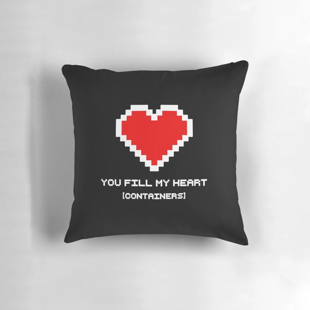 Retro video game-themed heart-shaped pillow with 8-bit graphics and bold colors