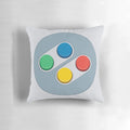 Decorative pillow featuring flat design vector art of classic video game controller buttons