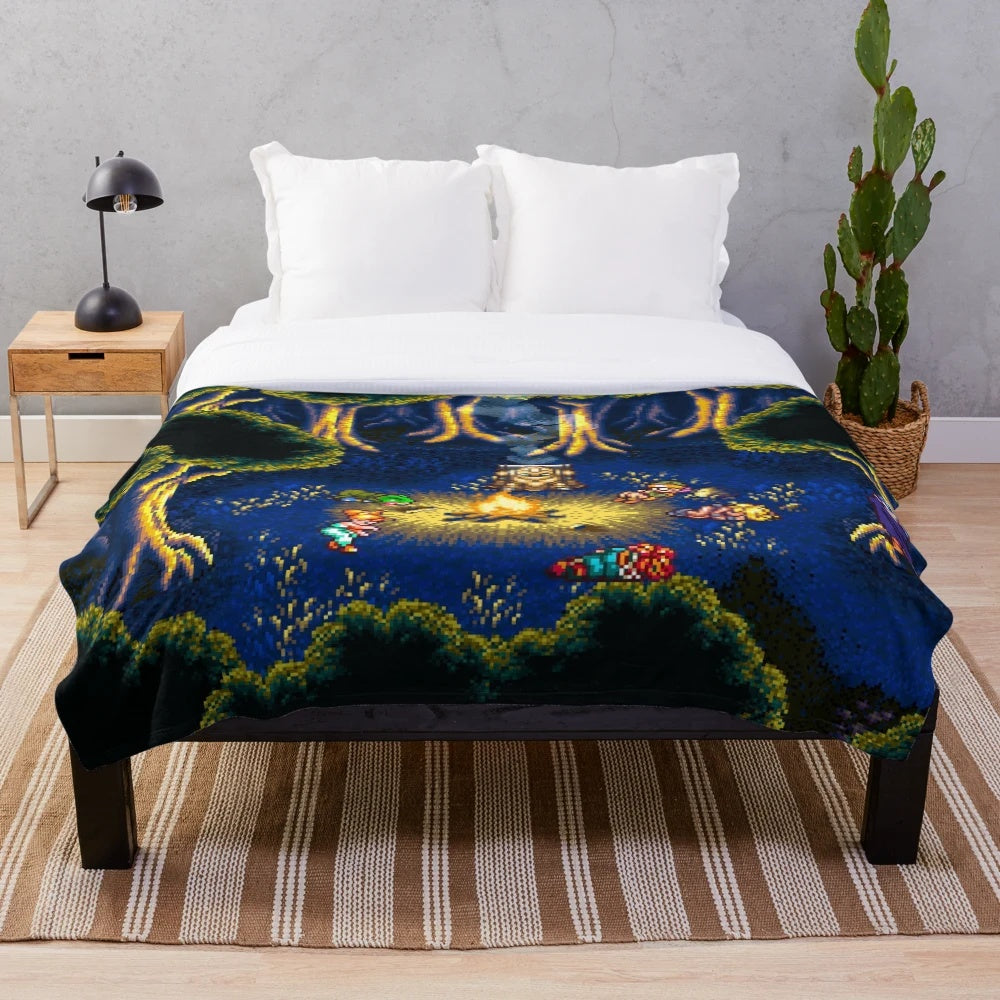 Retro gaming inspired plush blanket featuring Chrono Trigger pixel art campfire scene