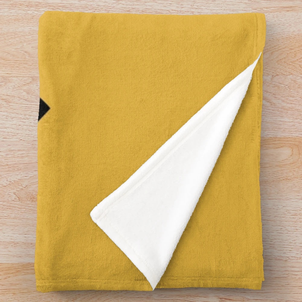 Plush blanket with gaming icons and "It's Dangerous to Go Alone" design
