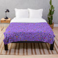 Retro gaming pixel art plush blanket featuring Earthbound inspired sprite sheet design