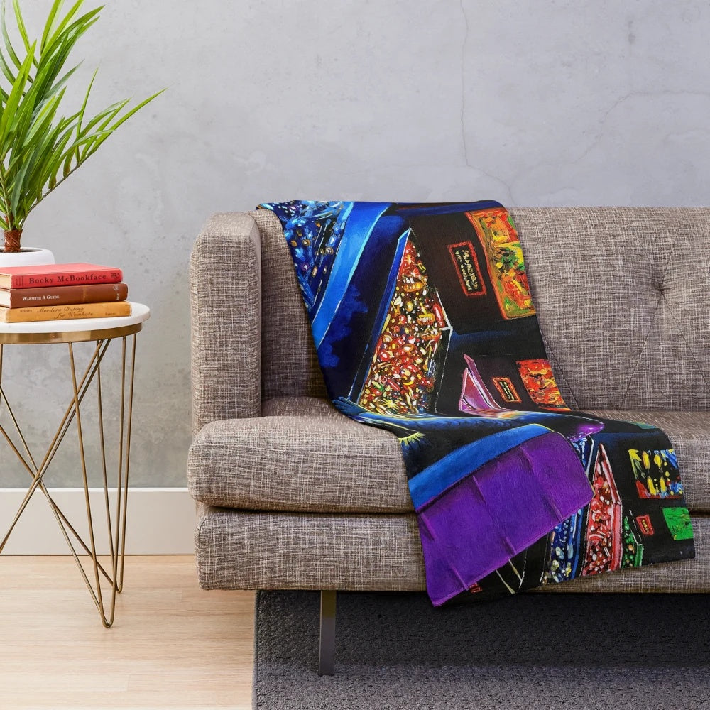 Pinball Wizard-inspired plush blanket with retro gaming and space-themed elements