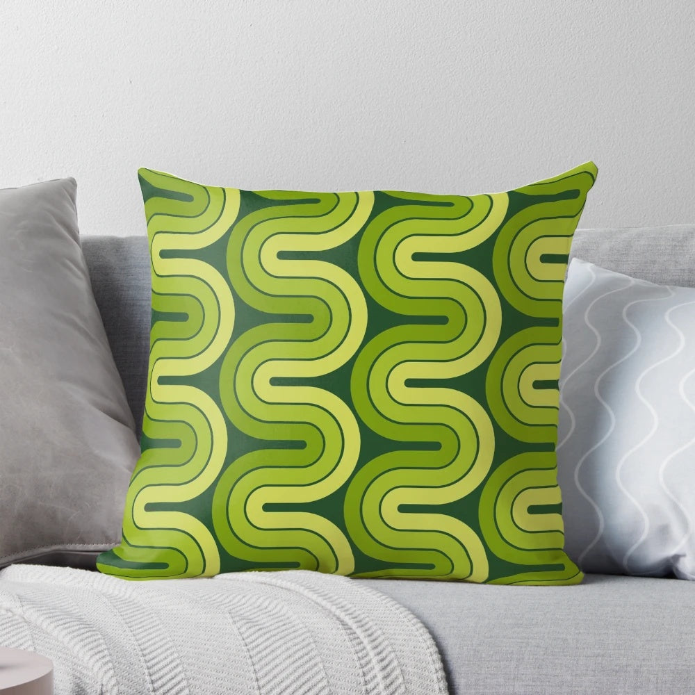 Retro geometric avocado green pillow with a 1960s-inspired pop art design