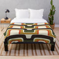 Retro geometric pattern plush blanket in midcentury modern style