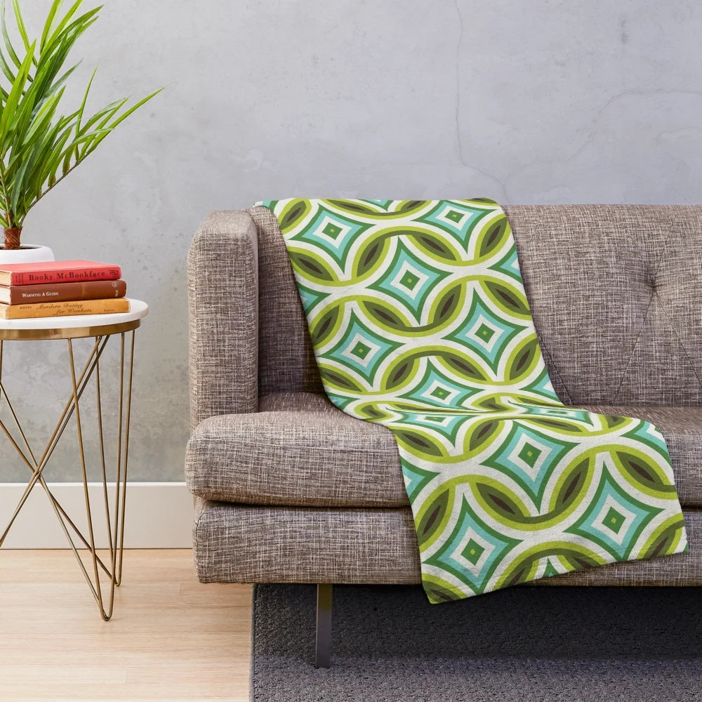 Retro geometric turquoise, green, and brown patterned plush blanket