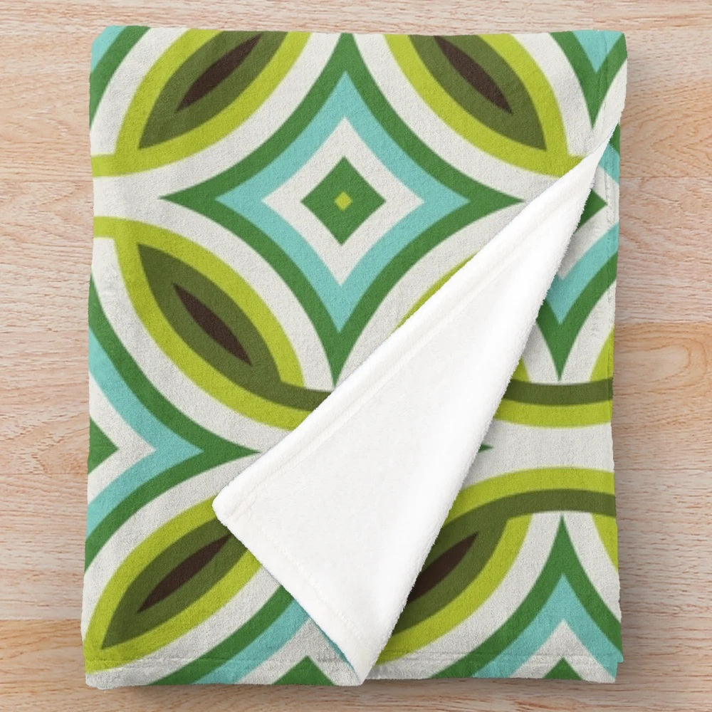 Retro geometric turquoise, green, and brown patterned plush blanket