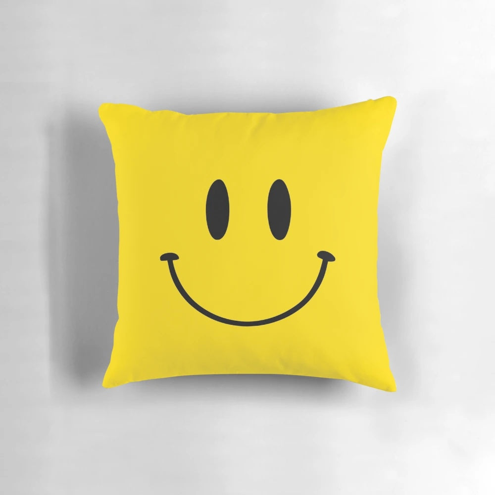 Colorful square throw pillow with a happy face design in a retro, nostalgic style