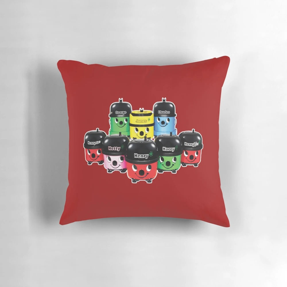 Vintage-style pillow featuring illustrations of Hoover vacuum cleaner characters