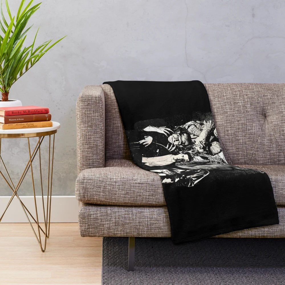Classic horror movie monsters Dracula, Frankenstein, Wolfman, Mummy on a plush blanket