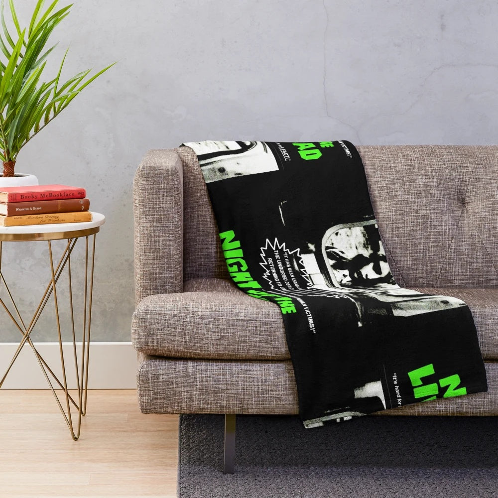 Retro horror film plush blanket featuring classic zombie movie design