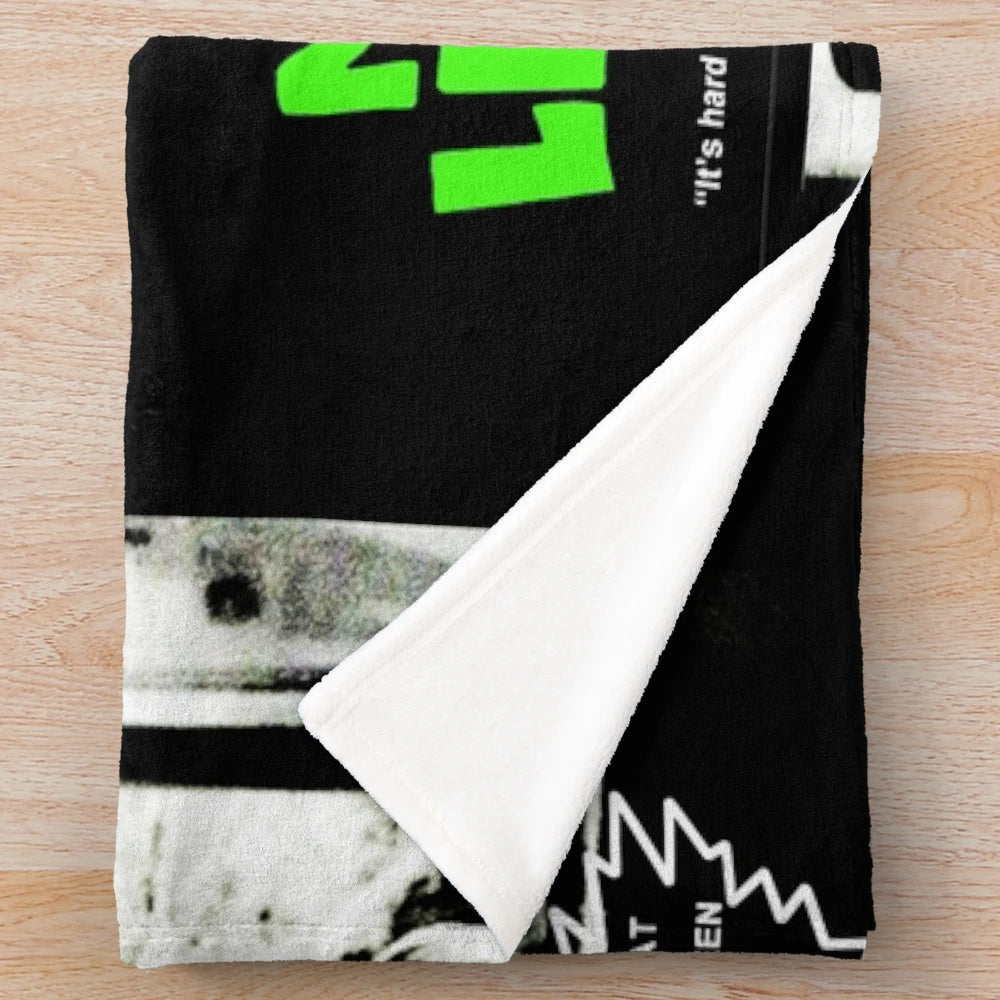 Retro horror film plush blanket featuring classic zombie movie design