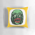 Retro-style throw pillow featuring the iconic Creature from the Black Lagoon movie monster