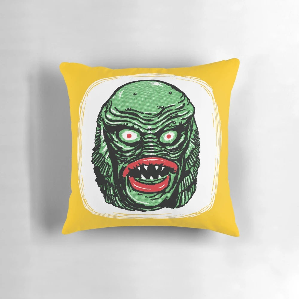 Retro-style throw pillow featuring the iconic Creature from the Black Lagoon movie monster
