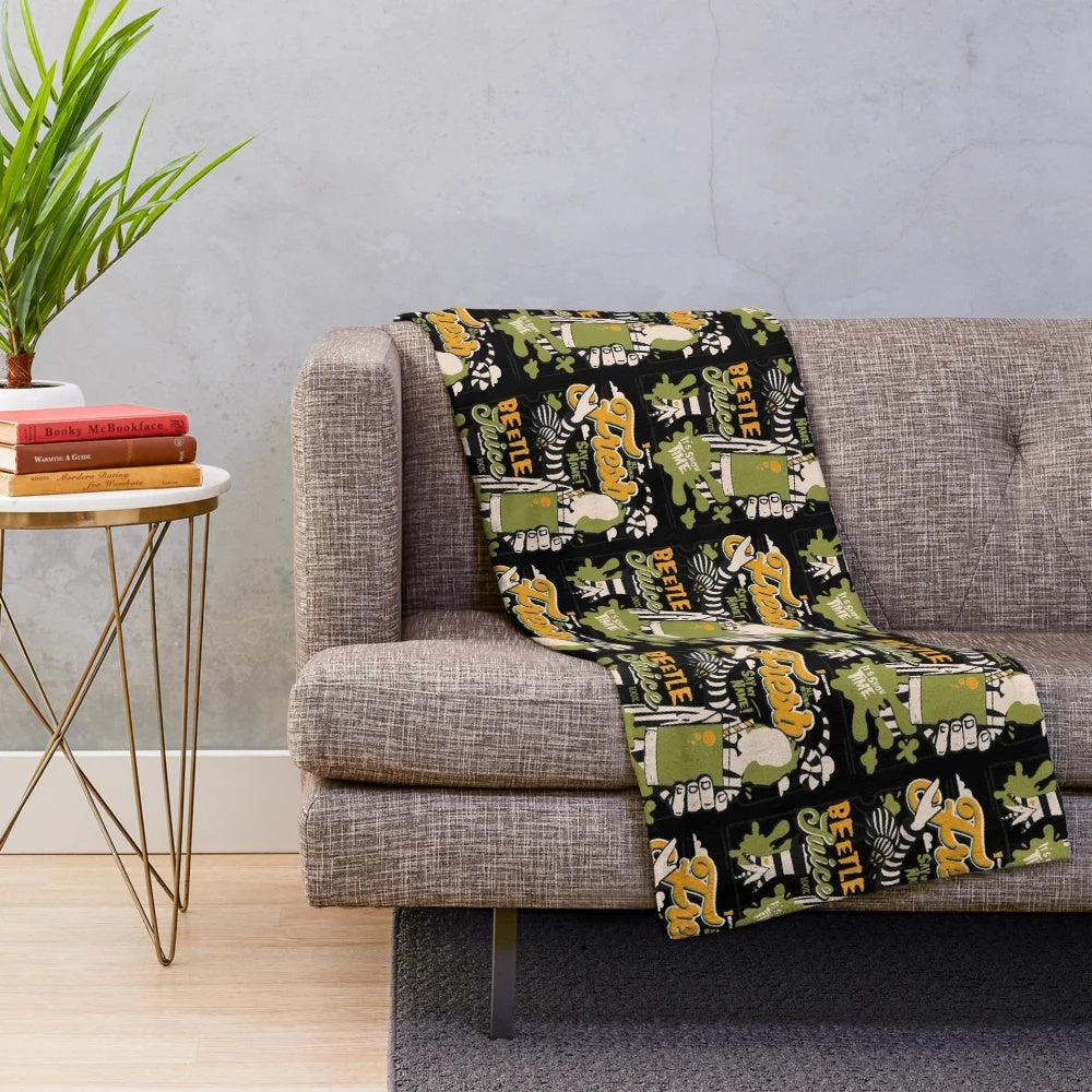 Beetlejuice-themed plush blanket with iconic movie character design