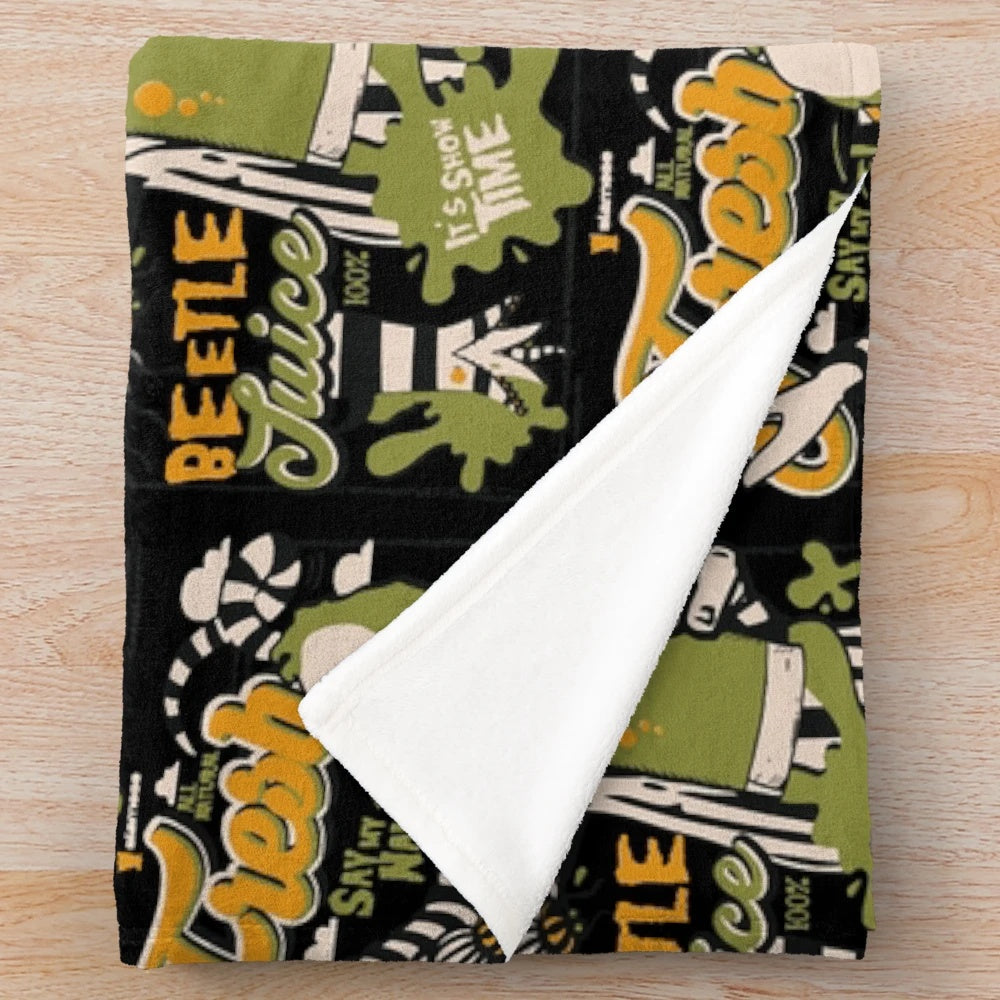 Beetlejuice-themed plush blanket with iconic movie character design