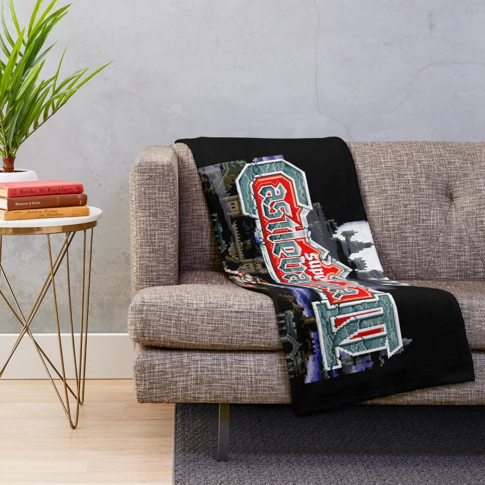 Retro gaming inspired plush blanket with castle moon rise design