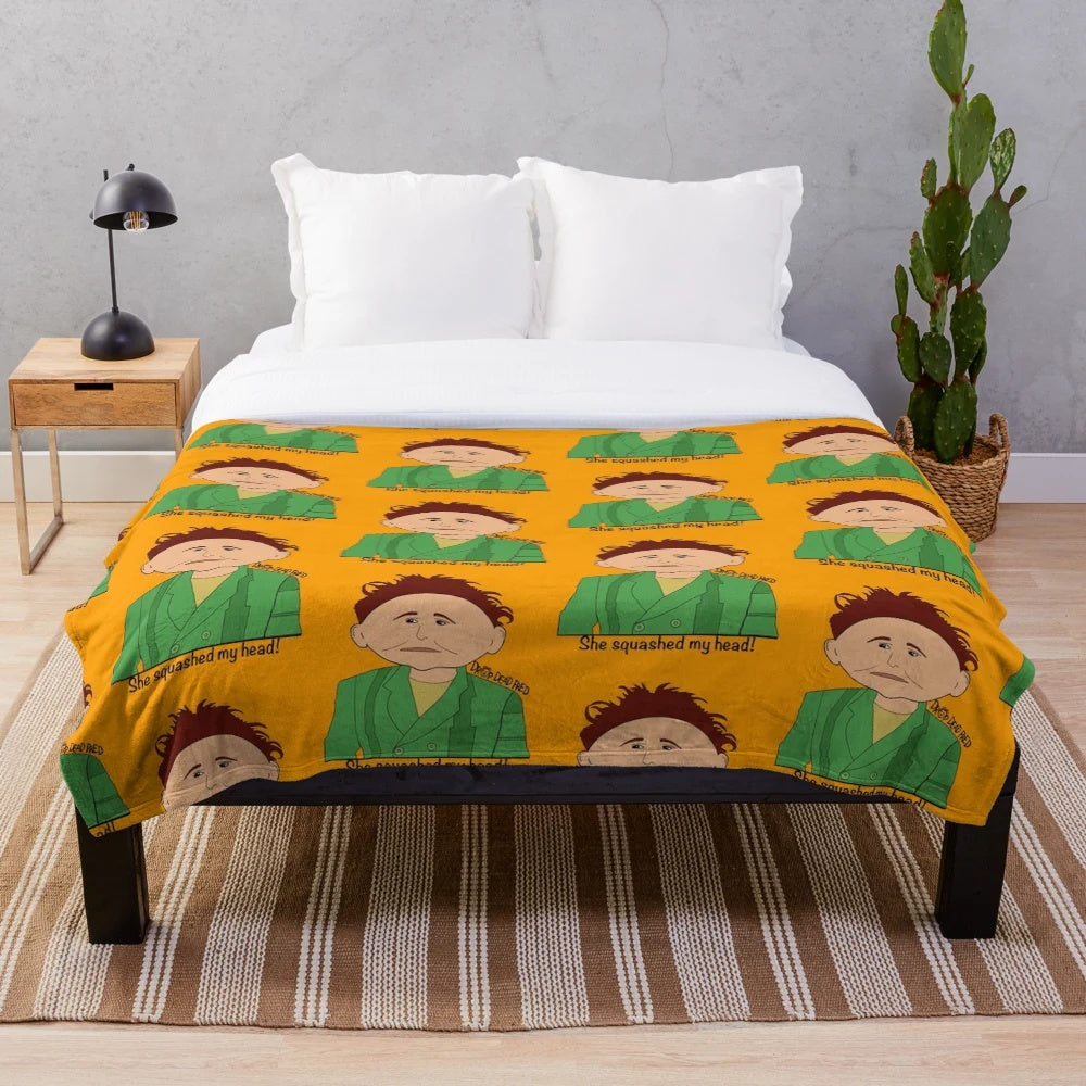 Plush Drop Dead Fred blanket featuring iconic movie quote "she squashed my head