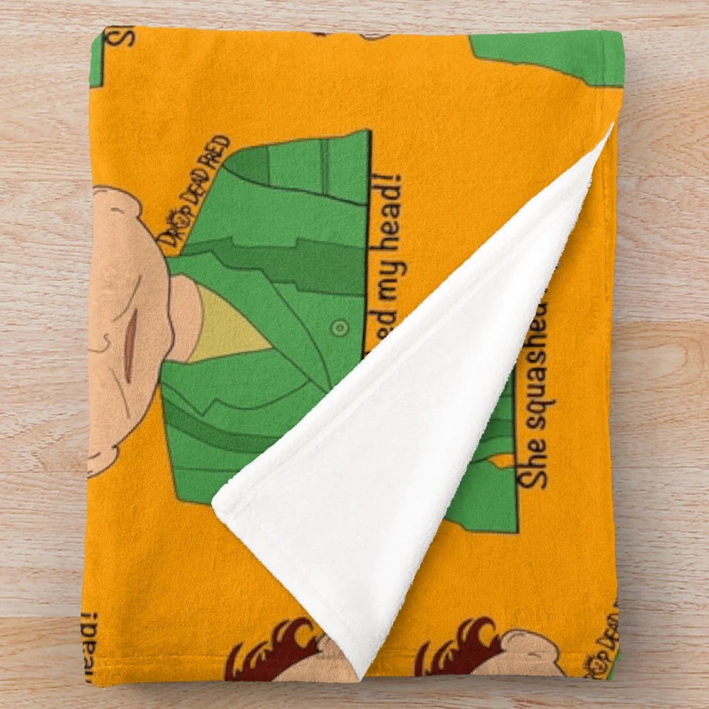 Plush Drop Dead Fred blanket featuring iconic movie quote "she squashed my head