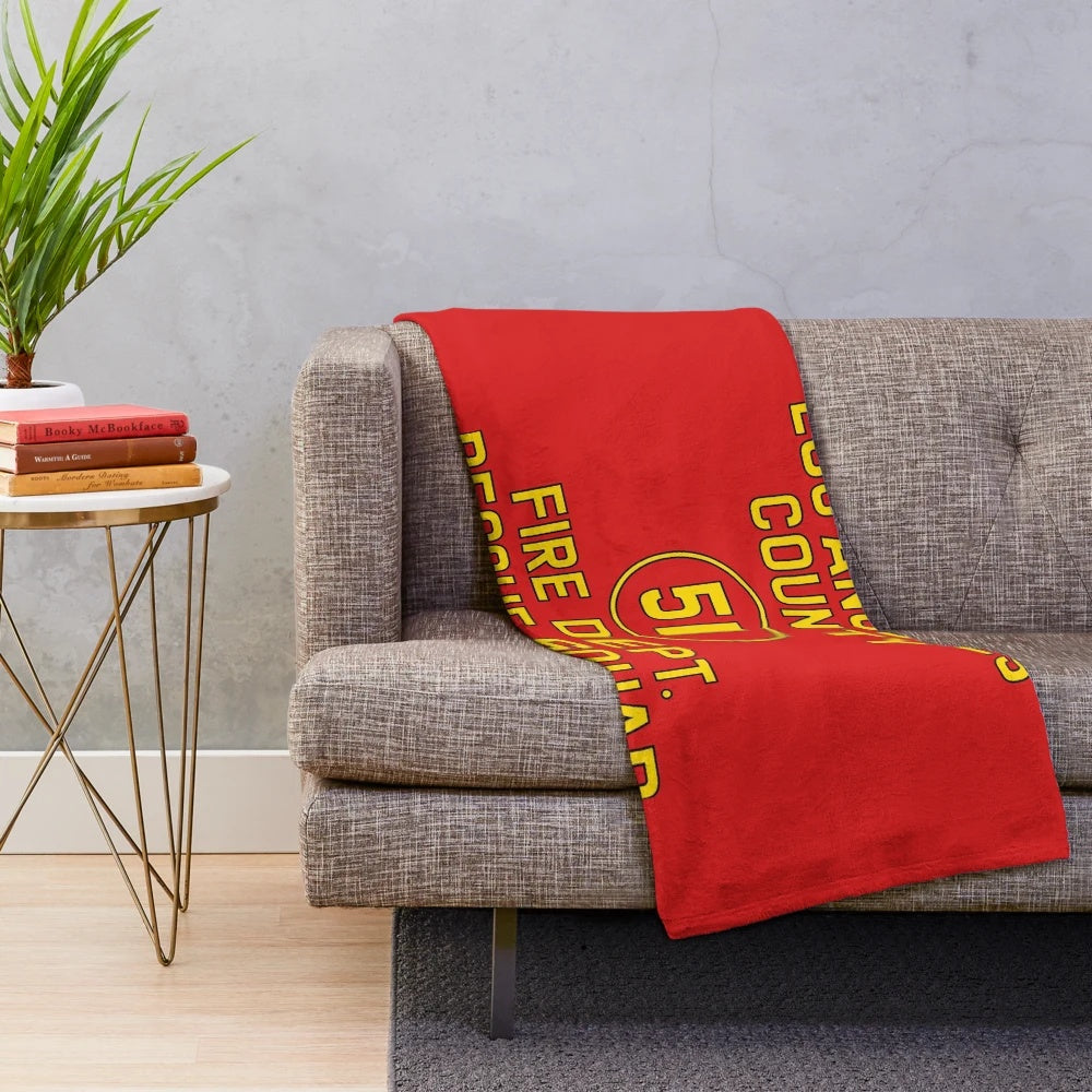 Retro-inspired plush blanket featuring the iconic Squad 51 logo from the TV show Emergency!