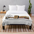 Plush blanket featuring the vintage design of the Everyman Cinema in York, England