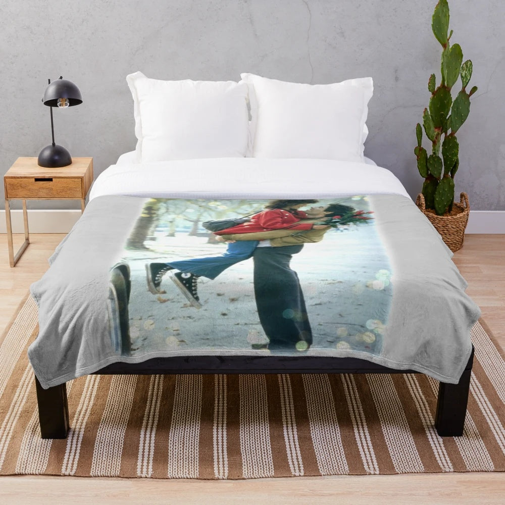 Flashdance-inspired plush blanket with a watercolor design