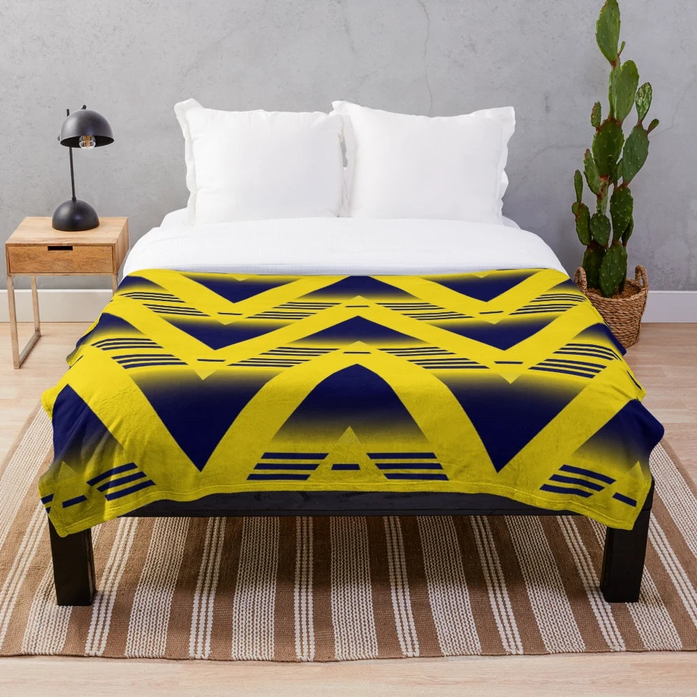 Retro-inspired plush blanket featuring the Arsenal FC logo and colors