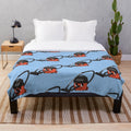 Plush blanket featuring a retro-inspired design of the iconic Henry Hoover vacuum cleaner