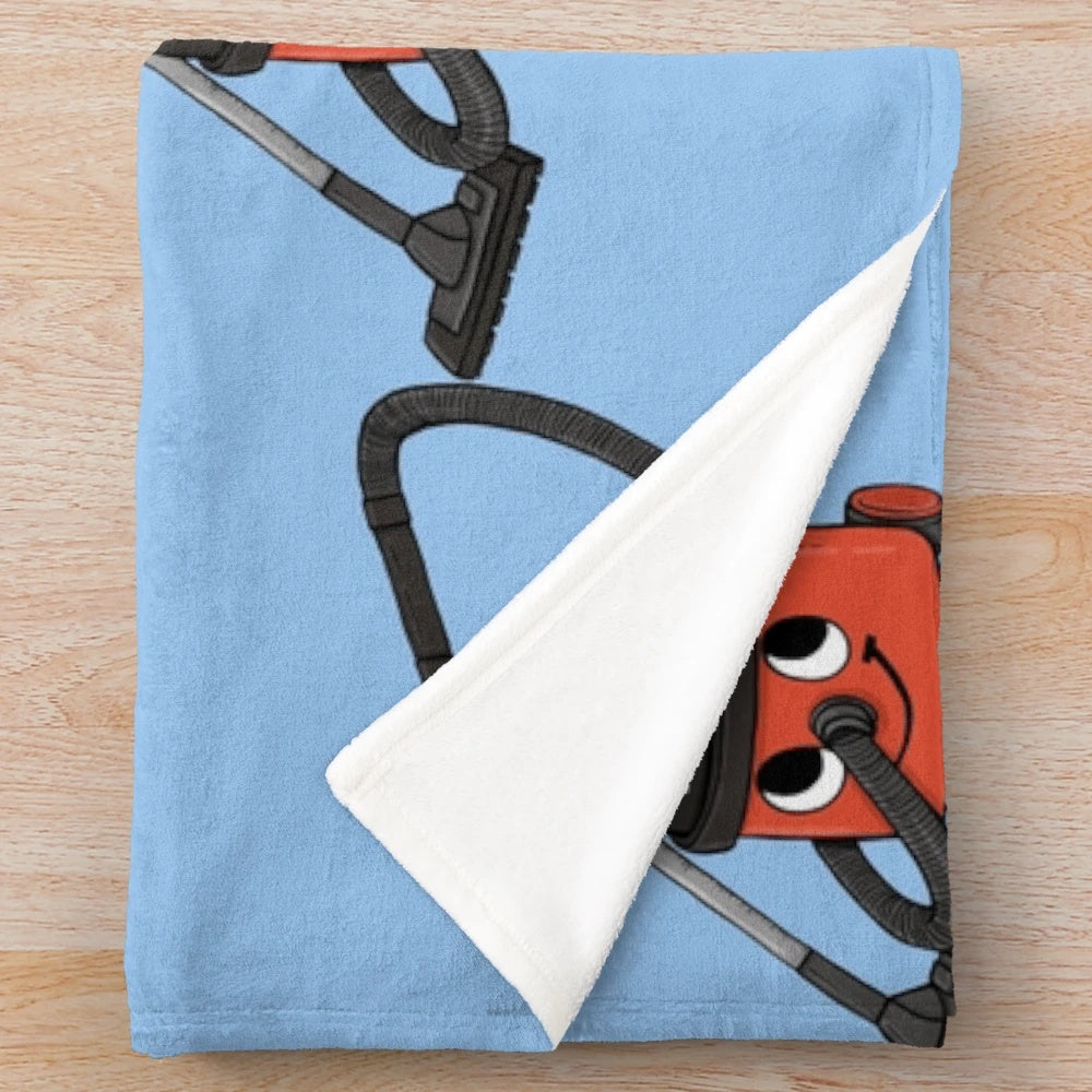 Plush blanket featuring a retro-inspired design of the iconic Henry Hoover vacuum cleaner