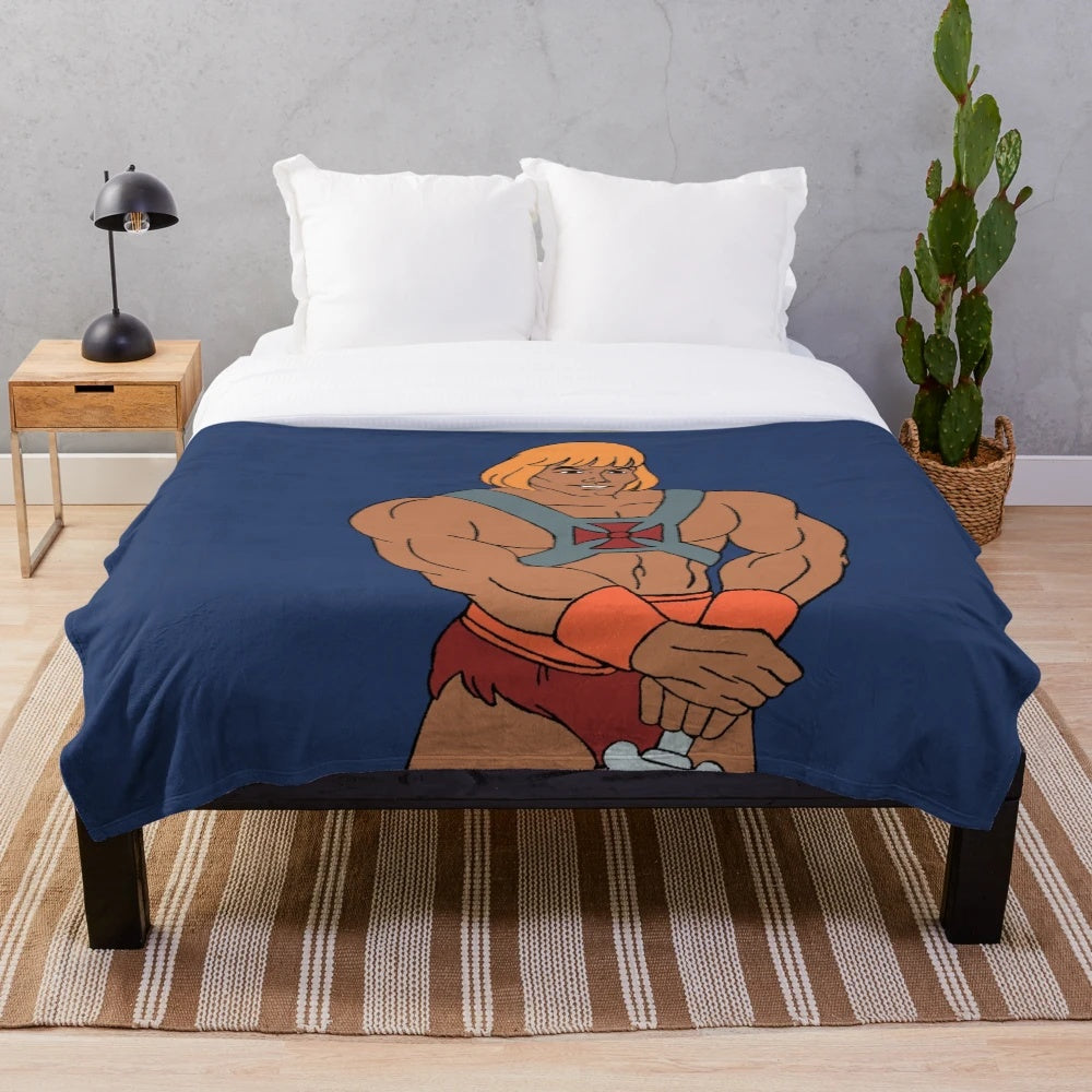 Retro-inspired Masters of the Universe plush blanket featuring He-Man, Skeletor, and other classic characters
