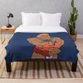 Retro-inspired Masters of the Universe plush blanket featuring He-Man, Skeletor, and other classic characters